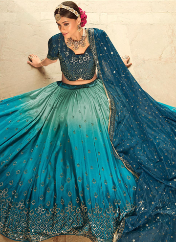 Fancy Choli With Shaded Teal Blue Embroidered Lehenga Choli